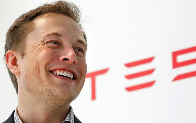 Tesla CEO Elon Musk, seen above thinking about all sorts of boobs. - (AP Photo)